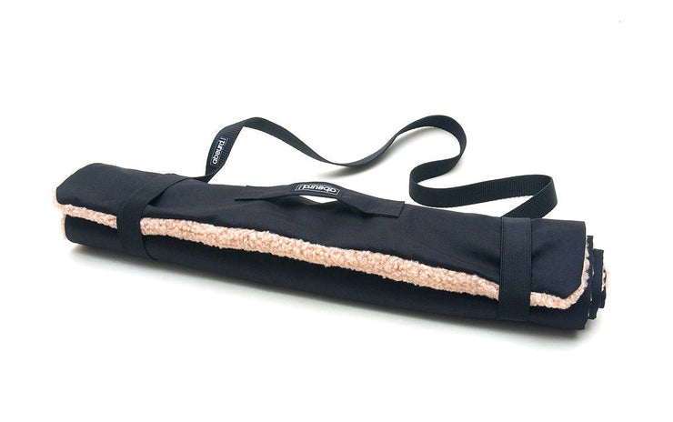Rolled up the Settle Mat becomes a Travel Mat with additional carrying handle